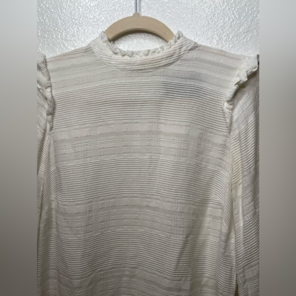 Reformation Cream Mock neck long sleeve blouse xxs
Purchased from The Real Real - Picture 5 of 14